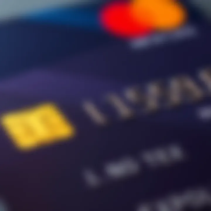 A close-up of a credit card showing the expiration date with a renewal notice beside it.