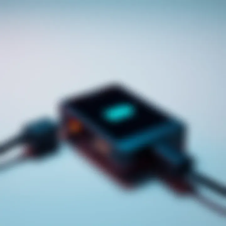 A Ledger device connected to a charging cable, showing a battery icon on the screen