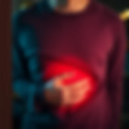 A person looks uncomfortable, holding their stomach as they experience nausea.